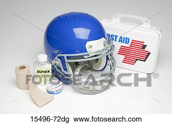 Stock Photo - bottles of pills, 
football helmet 
and first aid 
kit. fotosearch 
- search stock 
photos, pictures, 
images, and photo 
clipart