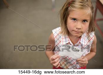Stock Photo - girl holding late 
pass. fotosearch 
- search stock 
photos, pictures, 
images, and photo 
clipart