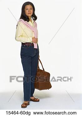 Stock Photo - woman carrying 
duffel bag. fotosearch 
- search stock 
photos, pictures, 
images, and photo 
clipart