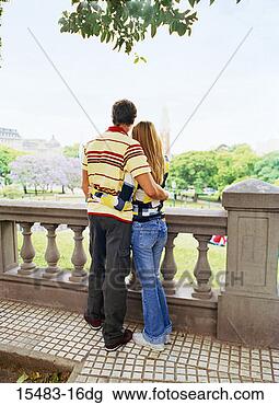 Stock Photo - backview of couple 
on balcony looking 
out over buenos 
aires. fotosearch 
- search stock 
photos, pictures, 
images, and photo 
clipart