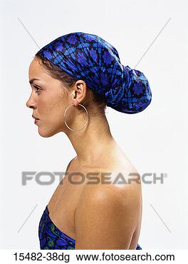 Stock Photo - sideview of a 
latina standing. 
fotosearch - search 
stock photos, 
pictures, images, 
and photo clipart