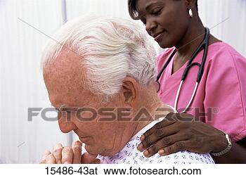 Stock Photo - doctor consoling 
patient. fotosearch 
- search stock 
photos, pictures, 
images, and photo 
clipart
