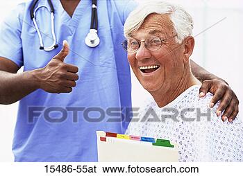 Stock Photo - doctor giving 
patient thumbs-up 
sign. fotosearch 
- search stock 
photos, pictures, 
images, and photo 
clipart