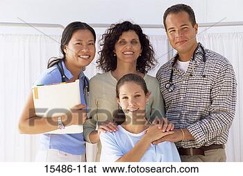 Stock Photo - medical caregivers 
with patient. 
fotosearch - search 
stock photos, 
pictures, images, 
and photo clipart
