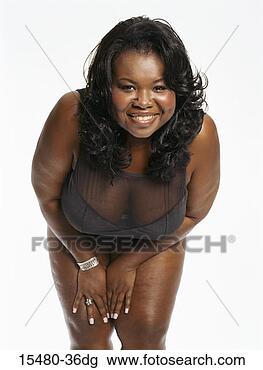 Stock Photo - plus-sized african-american 
woman wearing 
bathing suit, 
 standing. fotosearch 
- search stock 
photos, pictures, 
images, and photo 
clipart