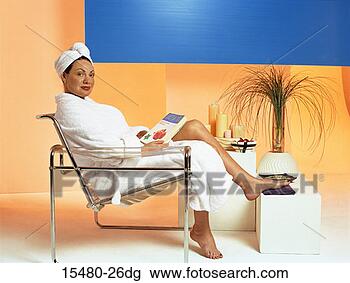 Stock Photo - plus-sized woman 
sitting in bathrobe, 
towel on her head, 
in a spa. fotosearch 
- search stock 
photos, pictures, 
images, and photo 
clipart