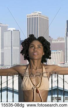Stock Photo - woman in yoga 
position, new 
york city, ny. 
fotosearch - search 
stock photos, 
pictures, images, 
and photo clipart