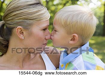 Stock Photo - mother and son 
touching noses 
outside. fotosearch 
- search stock 
photos, pictures, 
images, and photo 
clipart