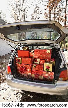 Stock Photo - car loaded with 
christmas presents 
in driveway of 
home. fotosearch 
- search stock 
photos, pictures, 
images, and photo 
clipart