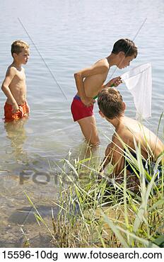 Banco de Imagem - meninos,  pesca, 
 rede. fotosearch 
- busca de fotos, 
imagens e clipart