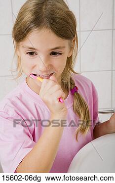 Stock Photo - girl brushing 
teeth. fotosearch 
- search stock 
photos, pictures, 
images, and photo 
clipart