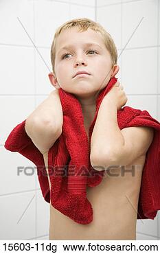 Stock Photo - boy drying off 
with towel in 
bathroom. fotosearch 
- search stock 
photos, pictures, 
images, and photo 
clipart