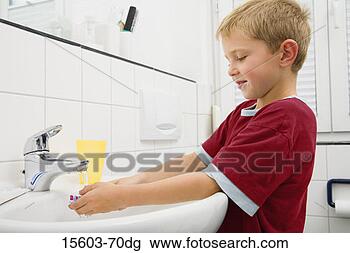 Stock Photo - boy washing his 
hands in bathroom. 
fotosearch - search 
stock photos, 
pictures, images, 
and photo clipart