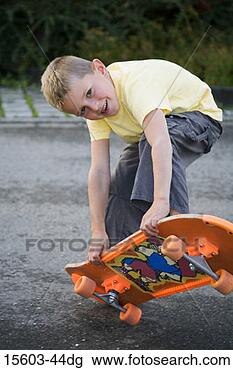 Stock Photo - skateboarding 
boy. fotosearch 
- search stock 
photos, pictures, 
images, and photo 
clipart