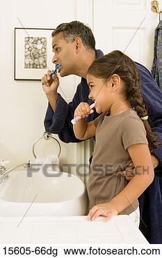 Stock Photo - father and daughter 
brushing teeth. 
fotosearch - search 
stock photos, 
pictures, images, 
and photo clipart