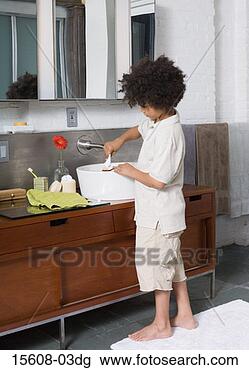 Stock Photo - boy brushing teeth. 
fotosearch - search 
stock photos, 
pictures, images, 
and photo clipart