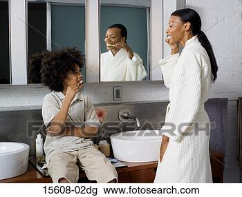 Stock Photo - mother and son 
brushing teeth. 
fotosearch - search 
stock photos, 
pictures, images, 
and photo clipart
