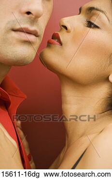 Stock Photo - woman kissing 
man. fotosearch 
- search stock 
photos, pictures, 
images, and photo 
clipart