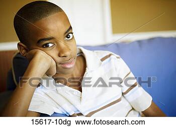 Stock Photo - bored boy. fotosearch 
- search stock 
photos, pictures, 
images, and photo 
clipart