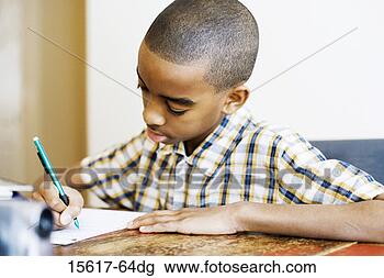 Stock Photo - boy doing homework. 
fotosearch - search 
stock photos, 
pictures, images, 
and photo clipart