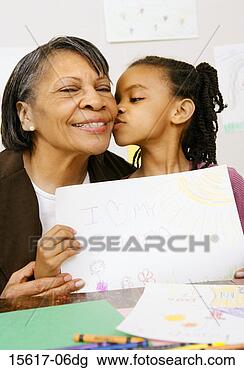 Stock Photo - girl kissing grandmother. 
fotosearch - search 
stock photos, 
pictures, images, 
and photo clipart