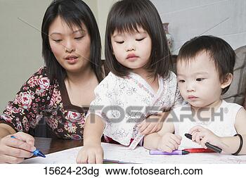 Stock Photo - mother and children 
coloring. fotosearch 
- search stock 
photos, pictures, 
images, and photo 
clipart