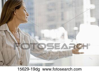 Stock Photo - businesswoman 
looking out window. 
fotosearch - search 
stock photos, 
pictures, images, 
and photo clipart