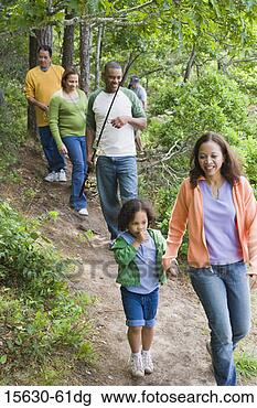 Stock Photo - family hiking 
on trail. fotosearch 
- search stock 
photos, pictures, 
images, and photo 
clipart
