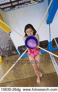 Stock Photo - girl shooting 
water balloon. 
fotosearch - search 
stock photos, 
pictures, images, 
and photo clipart