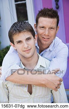 Stock Photo - gay couple embracing. 
fotosearch - search 
stock photos, 
pictures, images, 
and photo clipart