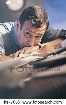 Stock Photo - businessman looking 
stressed. fotosearch 
- search stock 
photos, pictures, 
images, and photo 
clipart