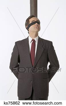 Stock Photo - businessman tied 
to a pole. fotosearch 
- search stock 
photos, pictures, 
images, and photo 
clipart
