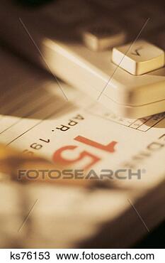 Stock Photo - calculator on 
top of april 15th 
calendar date. 
fotosearch - search 
stock photos, 
pictures, images, 
and photo clipart