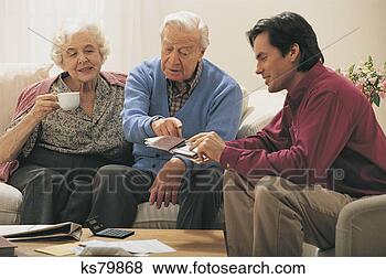 Stock Photo - couple doing personal 
finances. fotosearch 
- search stock 
photos, pictures, 
images, and photo 
clipart
