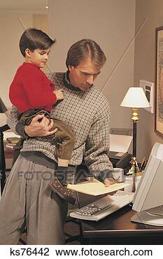 Stock Photo - man holding boy 
at computer. fotosearch 
- search stock 
photos, pictures, 
images, and photo 
clipart