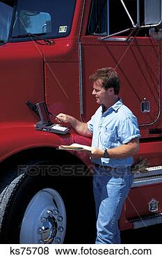 Stock Photo - man with laptop 
outside of truck. 
fotosearch - search 
stock photos, 
pictures, images, 
and photo clipart
