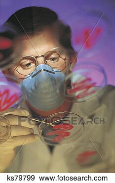 Stock Photograph - man with petri 
dishes. fotosearch 
- search stock 
photos, pictures, 
images, and photo 
clipart