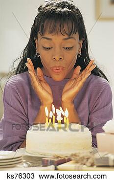Stock Photo - woman with birthday 
celebration. fotosearch 
- search stock 
photos, pictures, 
images, and photo 
clipart