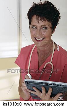 Stock Photography - medical professional 
with tablet pc, 
portrait. fotosearch 
- search stock 
photos, pictures, 
images, and photo 
clipart