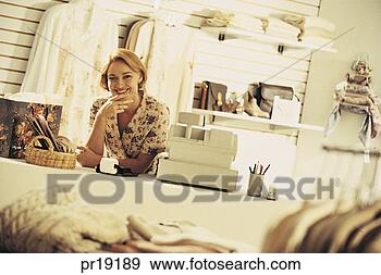 Stock Photograph - business woman/sales 
person in retail 
store. fotosearch 
- search stock 
photos, pictures, 
images, and photo 
clipart