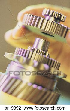 Stock Photo - closeup of gears; 
concept/metaphor. 
fotosearch - search 
stock photos, 
pictures, images, 
and photo clipart
