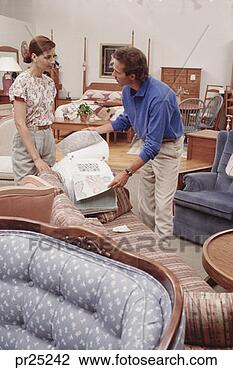 Stock Photo - couple shopping 
for furniture. 
fotosearch - search 
stock photos, 
pictures, images, 
and photo clipart