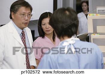 Stock Photo - doctors talking. 
fotosearch - search 
stock photos, 
pictures, images, 
and photo clipart