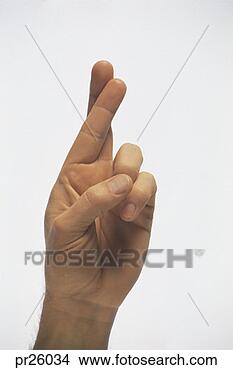 Stock Photo - hand crossing 
fingers. fotosearch 
- search stock 
photos, pictures, 
images, and photo 
clipart