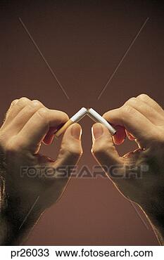 Stock Photo - hands breaking 
cigarette in half. 
fotosearch - search 
stock photos, 
pictures, images, 
and photo clipart