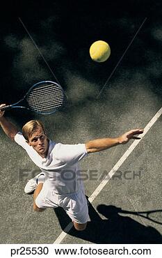 Stock Photography - man serving tennis 
ball; aerial. 
fotosearch - search 
stock photos, 
pictures, images, 
and photo clipart