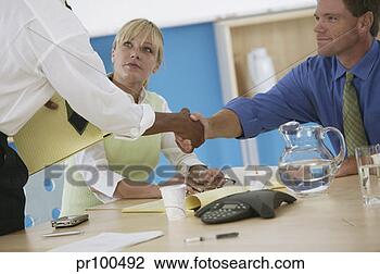 Stock Photo - meeting. fotosearch 
- search stock 
photos, pictures, 
images, and photo 
clipart