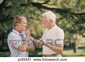 Stock Photography - men talking. fotosearch 
- search stock 
photos, pictures, 
images, and photo 
clipart