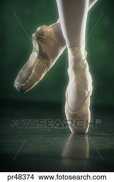 Stock Photo - ballet dancer's 
feet with pointe 
shoes on. fotosearch 
- search stock 
photos, pictures, 
images, and photo 
clipart