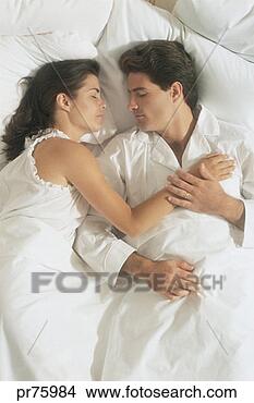 Stock Photo - couple asleep 
in bed. fotosearch 
- search stock 
photos, pictures, 
images, and photo 
clipart